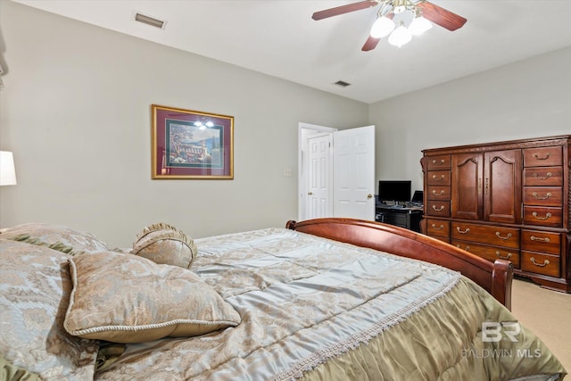 carpeted bedroom featuring ceiling fan