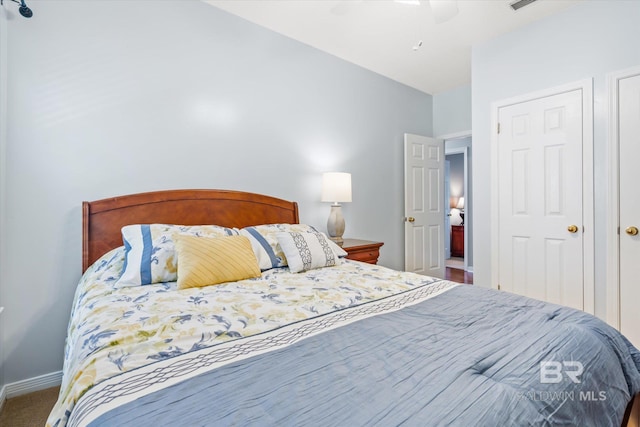 bedroom featuring ceiling fan and carpet floors