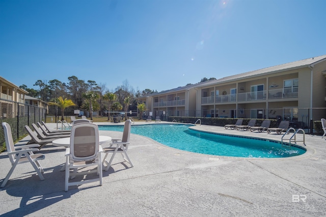 view of pool with a patio area