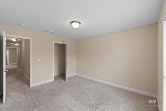18971 Tralee Ct, Foley, AL 36535 - unfurnished bedroom with light carpet, baseboards, and a closet