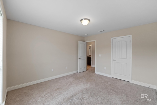 18971 Tralee Ct, Foley, AL 36535 - unfurnished bedroom with light carpet and baseboards
