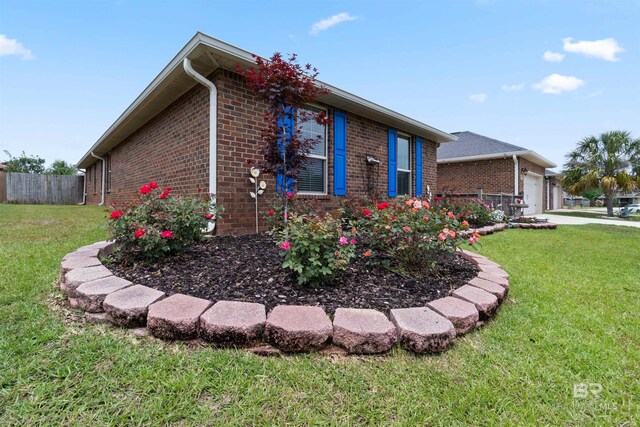 18971 Tralee Ct, Foley, AL 36535 - view of property exterior with brick siding and a garage
