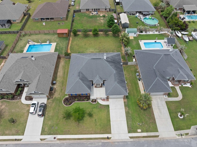 18971 Tralee Ct, Foley, AL 36535 - aerial perspective of suburban area featuring a pool area