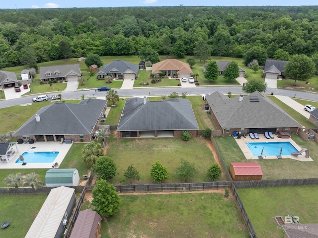 18971 Tralee Ct, Foley, AL 36535 - aerial view of residential area featuring a pool area and a forest