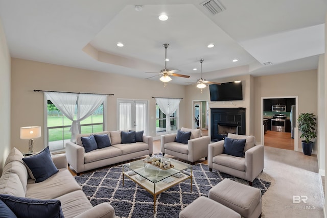 18971 Tralee Ct, Foley, AL 36535 - living area featuring a fireplace, a ceiling fan, and recessed lighting