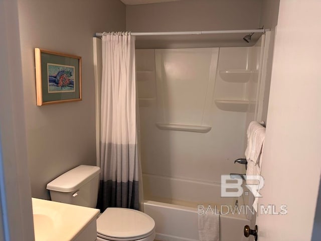 full bathroom with vanity, toilet, and shower / tub combo with curtain