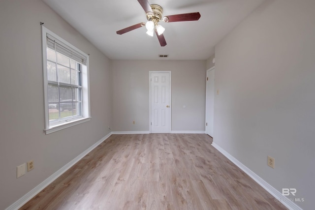 unfurnished room with light hardwood / wood-style floors and ceiling fan