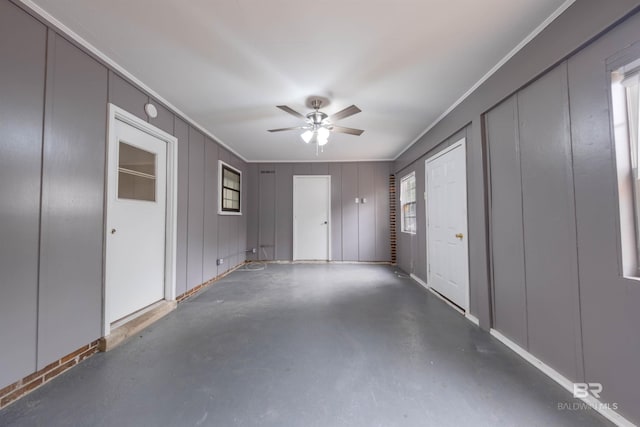 interior space featuring ceiling fan