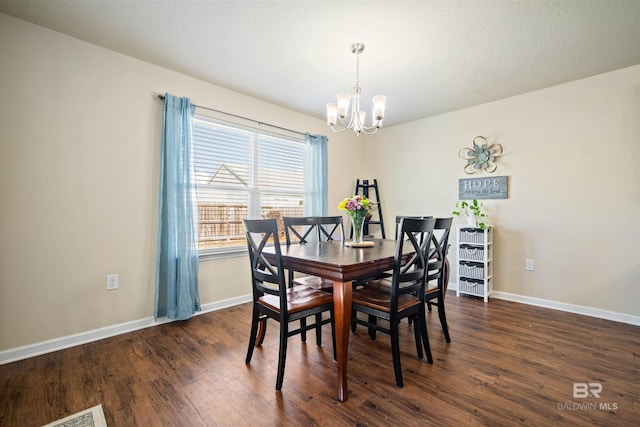 24189 Harvester Dr, Loxley, AL 36551 - dining area featuring a chandelier and dark wood-type flooring