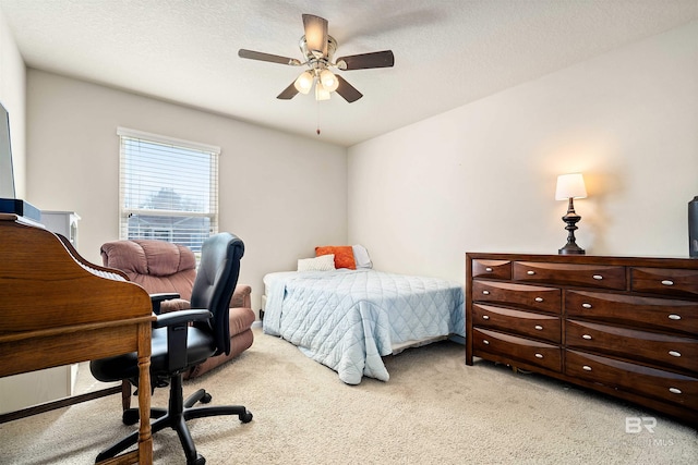 24189 Harvester Dr, Loxley, AL 36551 - bedroom with light carpet, an office area, and a ceiling fan
