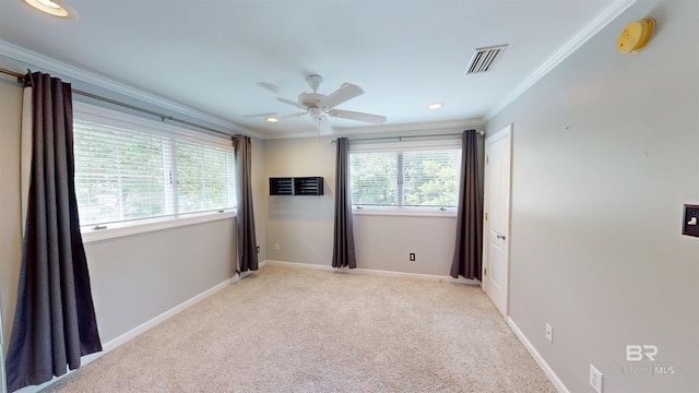 1651 Laurel St, Mobile, AL 36604 - unfurnished room featuring crown molding, ceiling fan, a smoke detector, light colored carpet, and recessed lighting