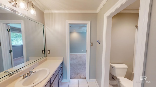 1651 Laurel St, Mobile, AL 36604 - half bathroom featuring toilet, vanity, crown molding, tile patterned flooring, and baseboards