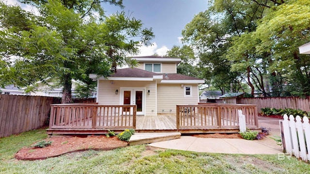 1651 Laurel St, Mobile, AL 36604 - rear view of property featuring french doors, a fenced backyard, a wooden deck, and roof with shingles