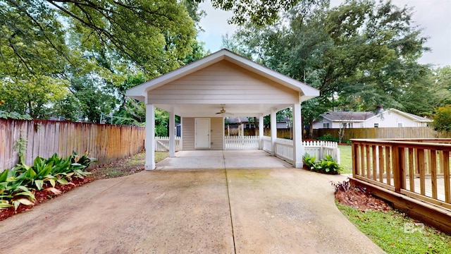 1651 Laurel St, Mobile, AL 36604 - view of parking / parking lot with a carport, driveway, and ceiling fan