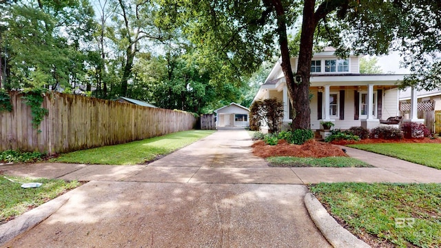1651 Laurel St, Mobile, AL 36604 - view of front of home with driveway and a porch
