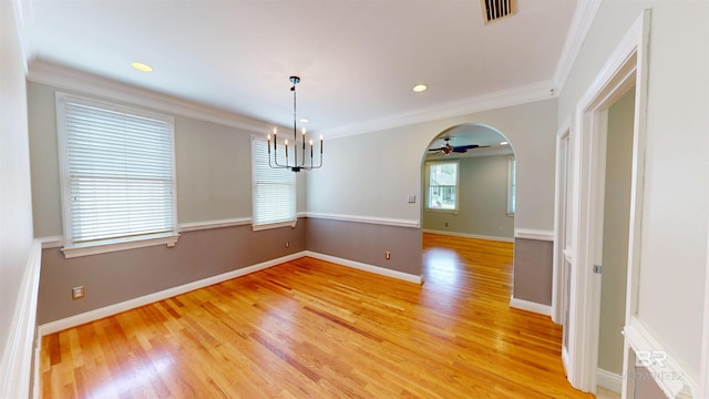 1651 Laurel St, Mobile, AL 36604 - empty room featuring light wood-style flooring, a chandelier, crown molding, ceiling fan, and baseboards