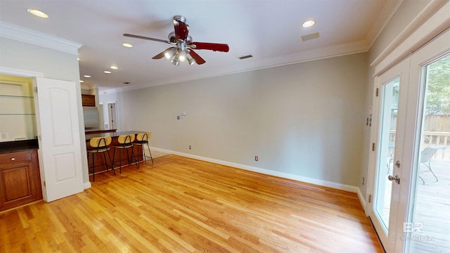 1651 Laurel St, Mobile, AL 36604 - unfurnished living room with ornamental molding, light wood-style floors, ceiling fan, baseboards, and recessed lighting