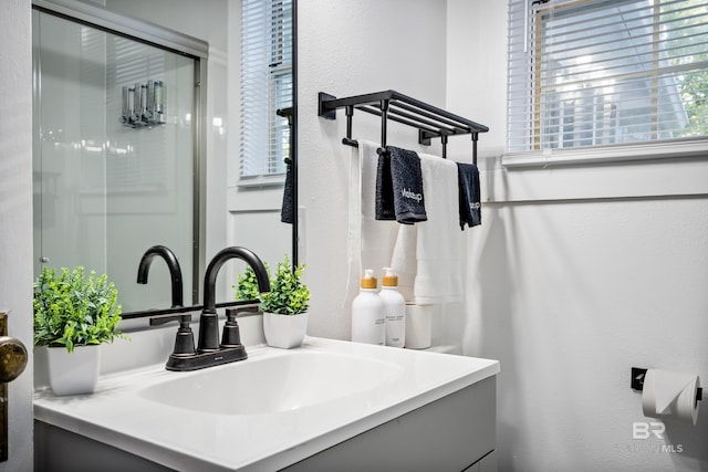 255 Pinehill Dr, Mobile, AL 36606 - bathroom with vanity and a textured wall