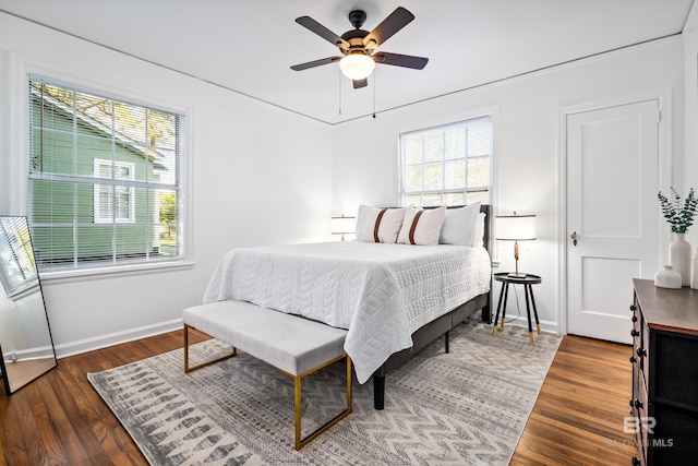 255 Pinehill Dr, Mobile, AL 36606 - bedroom with wood finished floors, baseboards, and a ceiling fan