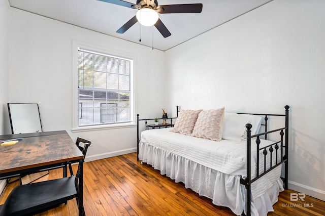 255 Pinehill Dr, Mobile, AL 36606 - bedroom featuring baseboards, wood-type flooring, and ceiling fan