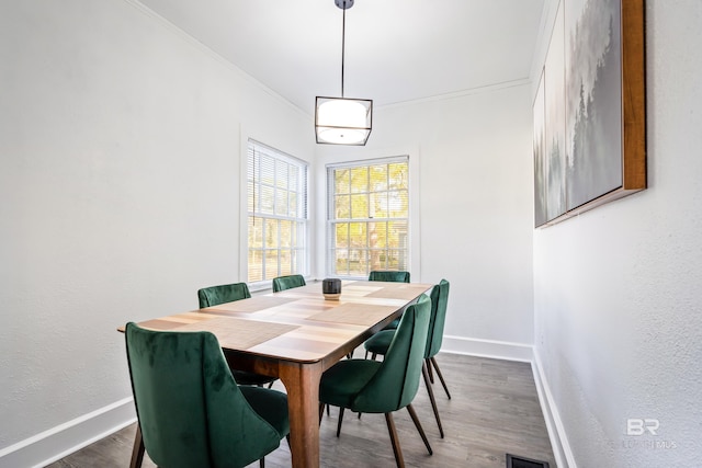 255 Pinehill Dr, Mobile, AL 36606 - dining space with baseboards, crown molding, wood finished floors, and a textured wall