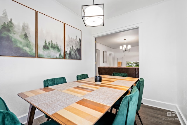 255 Pinehill Dr, Mobile, AL 36606 - dining room featuring baseboards, wood finished floors, ornamental molding, and a chandelier