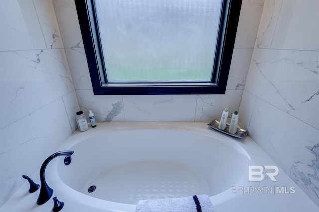 20752 Southwood St, Fairhope, AL 36532 - bathroom featuring plenty of natural light and a tub