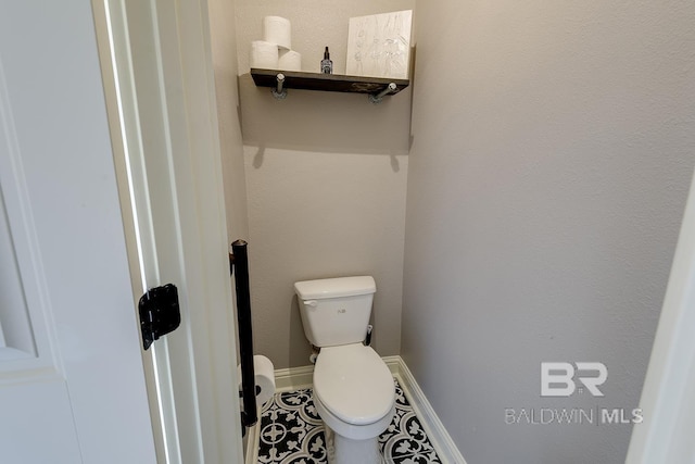 20752 Southwood St, Fairhope, AL 36532 - bathroom featuring toilet and tile patterned floors