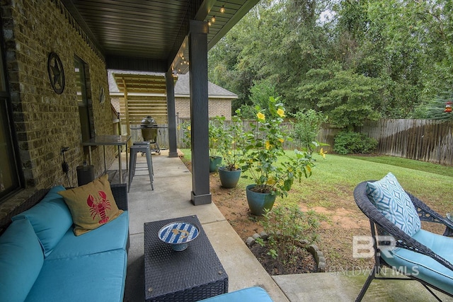 20752 Southwood St, Fairhope, AL 36532 - fenced backyard with a patio and outdoor lounge area