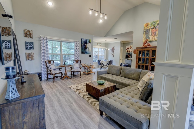 20752 Southwood St, Fairhope, AL 36532 - living room featuring vaulted ceiling and light wood-type flooring