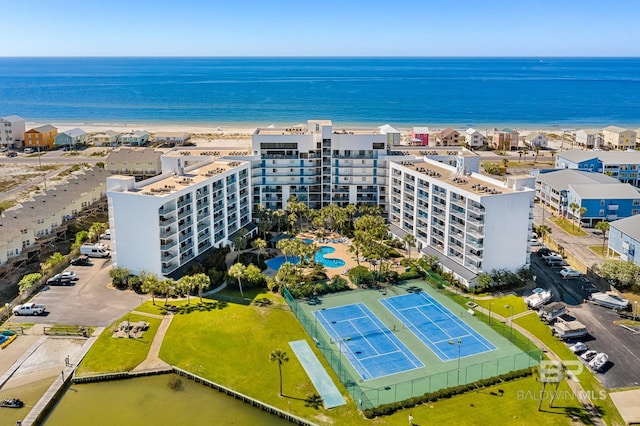 aerial view with a beach view and a water view