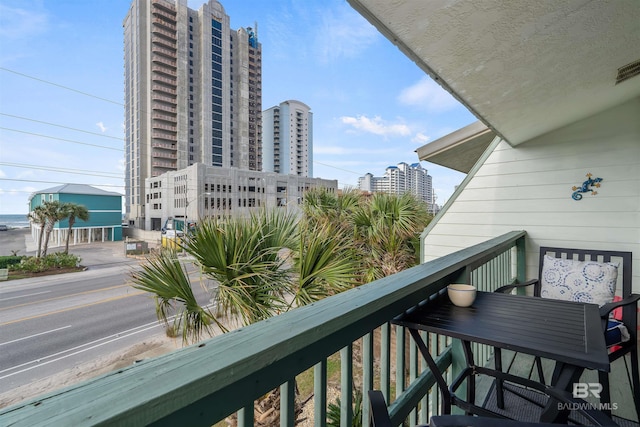 balcony featuring a city view