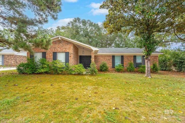 ranch-style house with a front yard