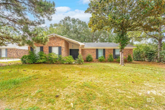 single story home with a front yard