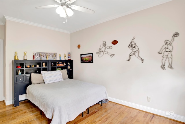 bedroom featuring crown molding, hardwood / wood-style floors, and ceiling fan