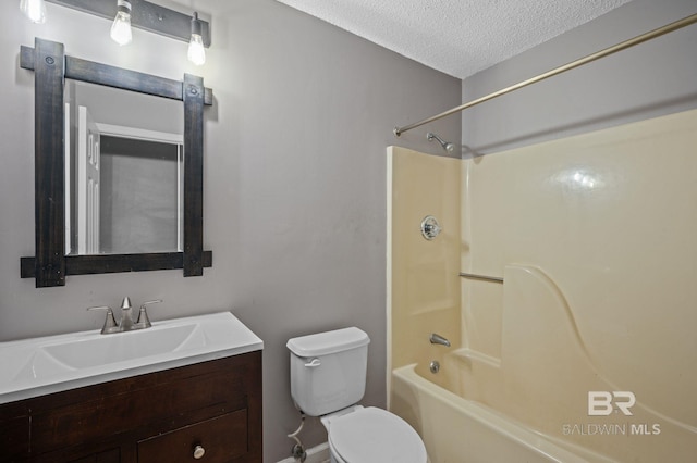 302 Norwood Ct, Bay Minette, AL 36507 - bathroom featuring a textured ceiling, toilet, tub / shower combination, vanity, and baseboards