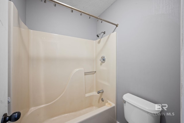 302 Norwood Ct, Bay Minette, AL 36507 - bathroom with toilet, shower / bathtub combination, and a textured ceiling