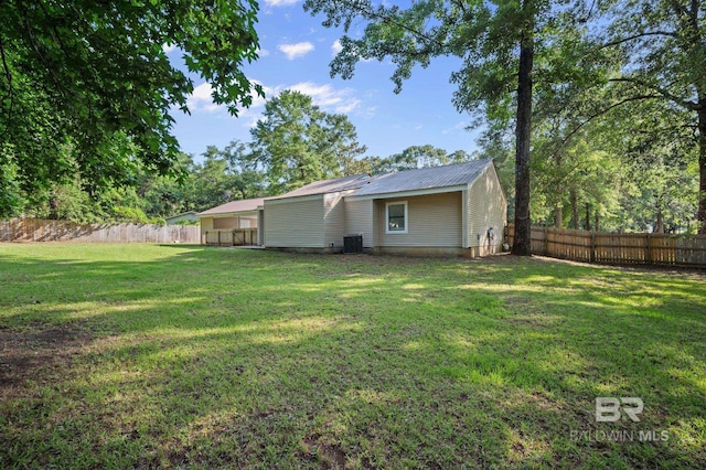 302 Norwood Ct, Bay Minette, AL 36507 - rear view of property with cooling unit and metal roof