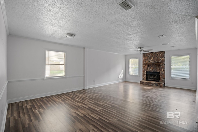 302 Norwood Ct, Bay Minette, AL 36507 - unfurnished living room with a ceiling fan, wood finished floors, a textured ceiling, plenty of natural light, and baseboards