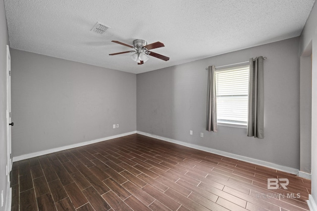 302 Norwood Ct, Bay Minette, AL 36507 - empty room featuring ceiling fan, dark wood finished floors, baseboards, and a textured ceiling