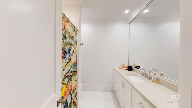 140 S Mcgregor Ave # E, Mobile, AL 36608 - bathroom with vanity, recessed lighting, baseboards, and tile patterned floors