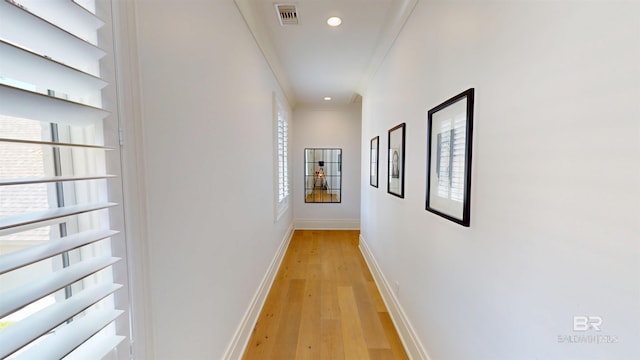 140 S Mcgregor Ave # E, Mobile, AL 36608 - hall featuring light wood-style floors, recessed lighting, baseboards, and crown molding