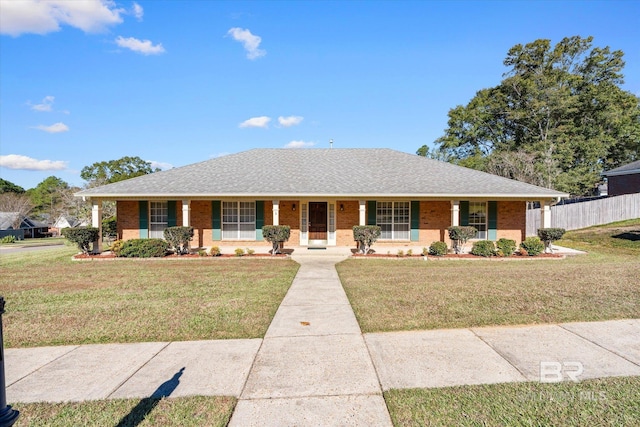 single story home featuring a front lawn and a porch