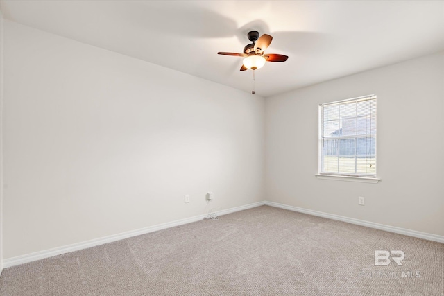 empty room with carpet flooring and ceiling fan