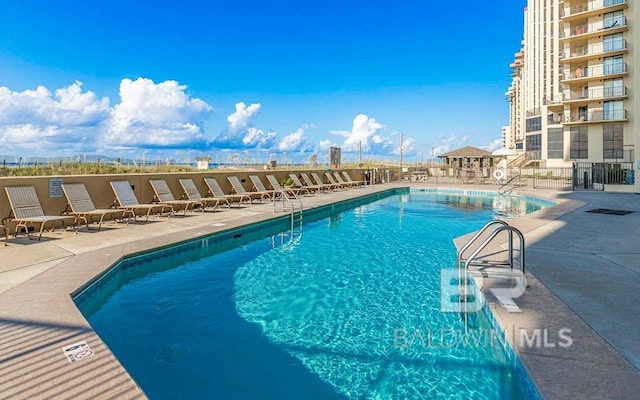 24250 Perdido Beach Blvd Unit 4603, Orange Beach, AL 36561 - community pool with a patio area