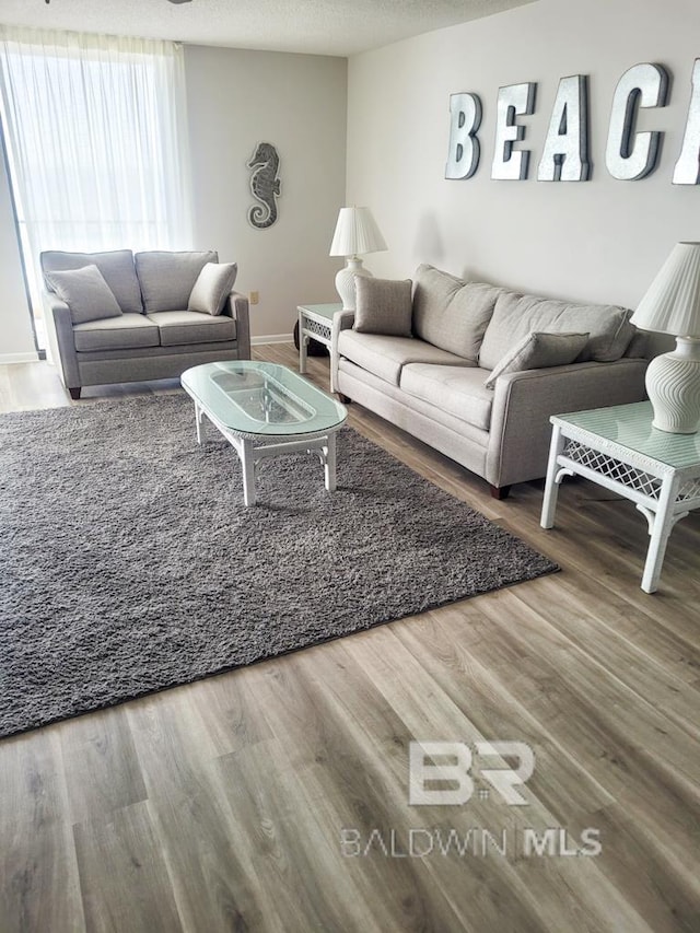 24250 Perdido Beach Blvd Unit 4603, Orange Beach, AL 36561 - living room with wood finished floors