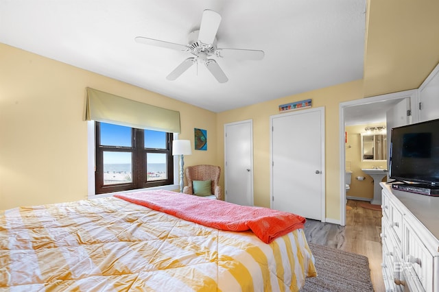 bedroom featuring ceiling fan and light hardwood / wood-style floors