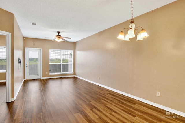 2651 S Juniper St Unit 1201, Foley, AL 36535 - unfurnished room featuring dark wood finished floors, a chandelier, baseboards, and ceiling fan