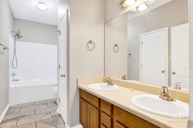 2651 S Juniper St Unit 1201, Foley, AL 36535 - full bath featuring double vanity, shower / bath combination, and baseboards