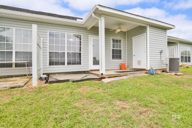2651 S Juniper St Unit 1201, Foley, AL 36535 - doorway to property featuring ceiling fan, a patio, a yard, and cooling unit